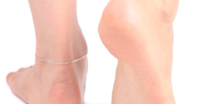 Womans feet over white